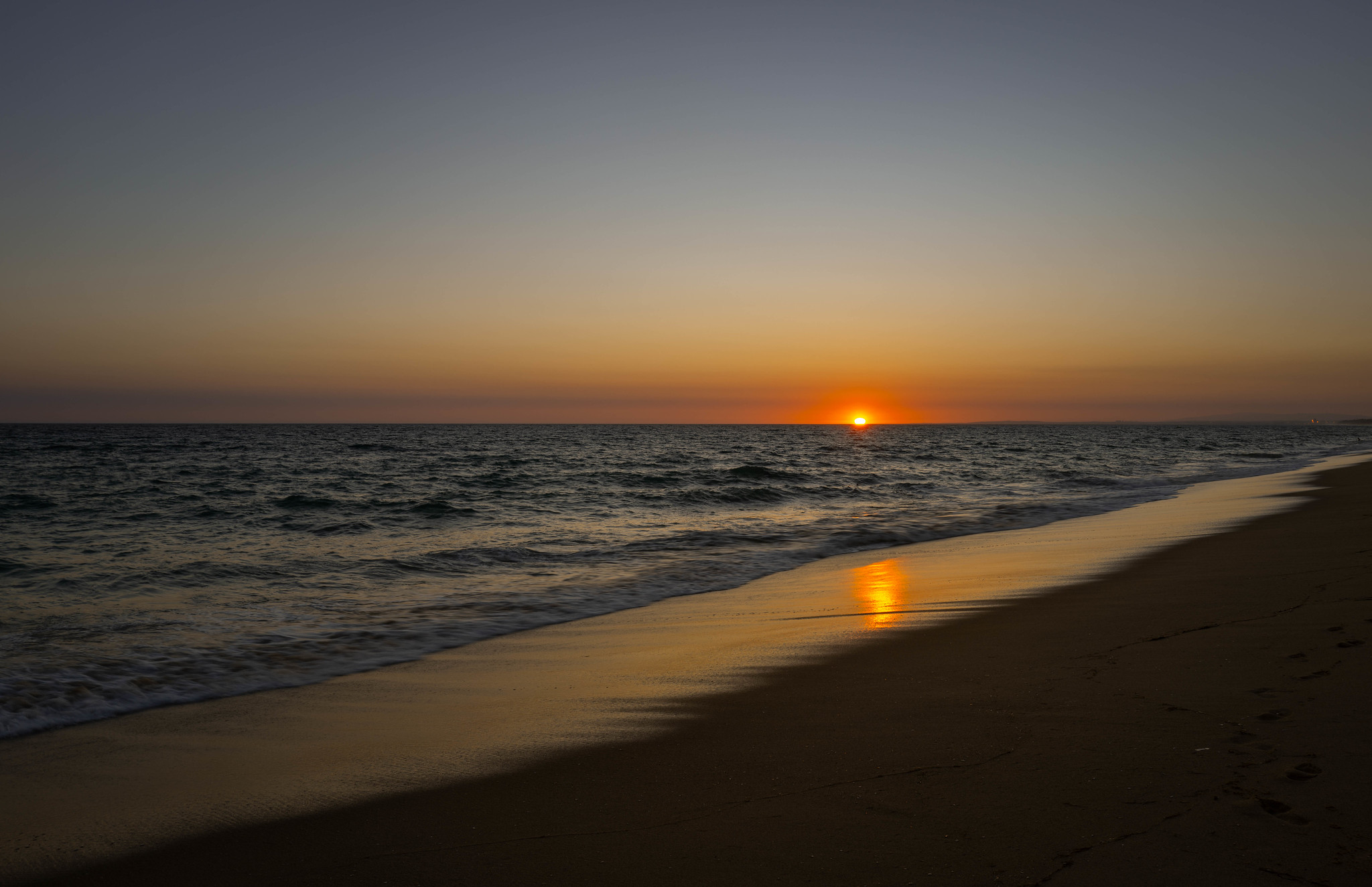 Sunset over the Atlantic at the Algarve coast